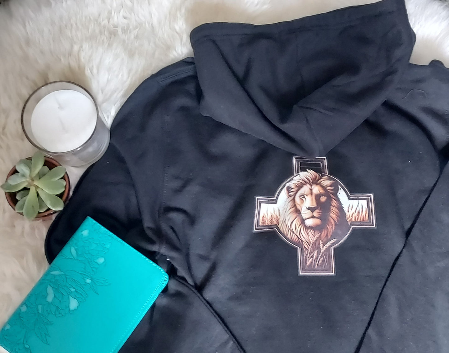 Christian women's zip up hoodie with Lion of Judah and cross design on the back