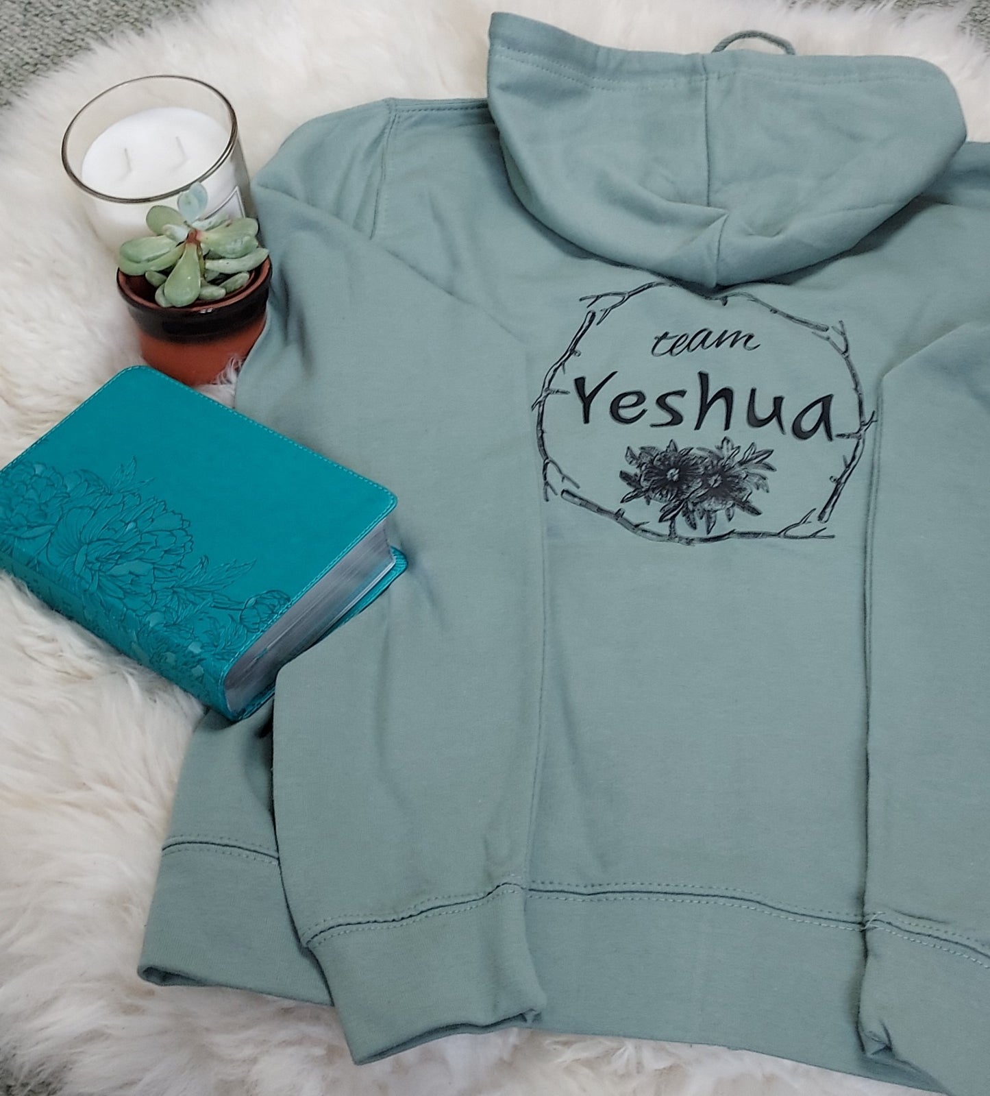 Jesus-themed Christian women's zip up hoodie with Team Yeshua design on the back