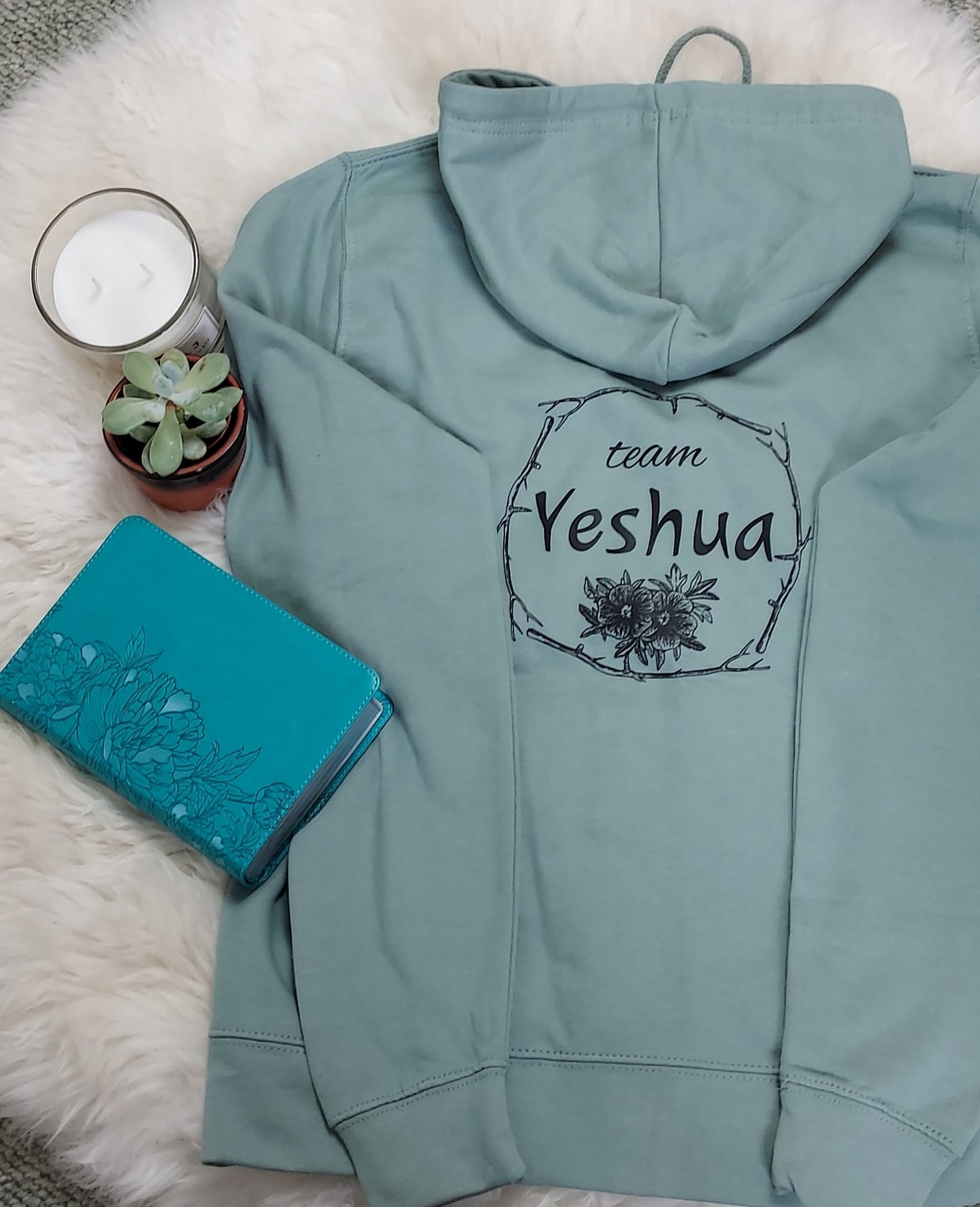 Jesus-themed Christian women's zip up hoodie with Team Yeshua design on the back