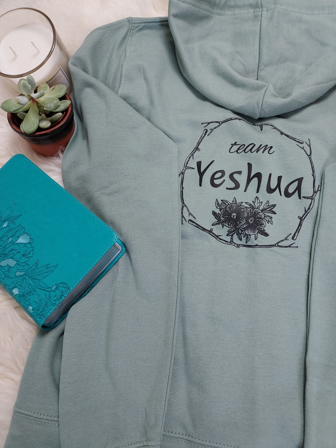 Jesus-themed Christian women's zip up hoodie with Team Yeshua design on the back