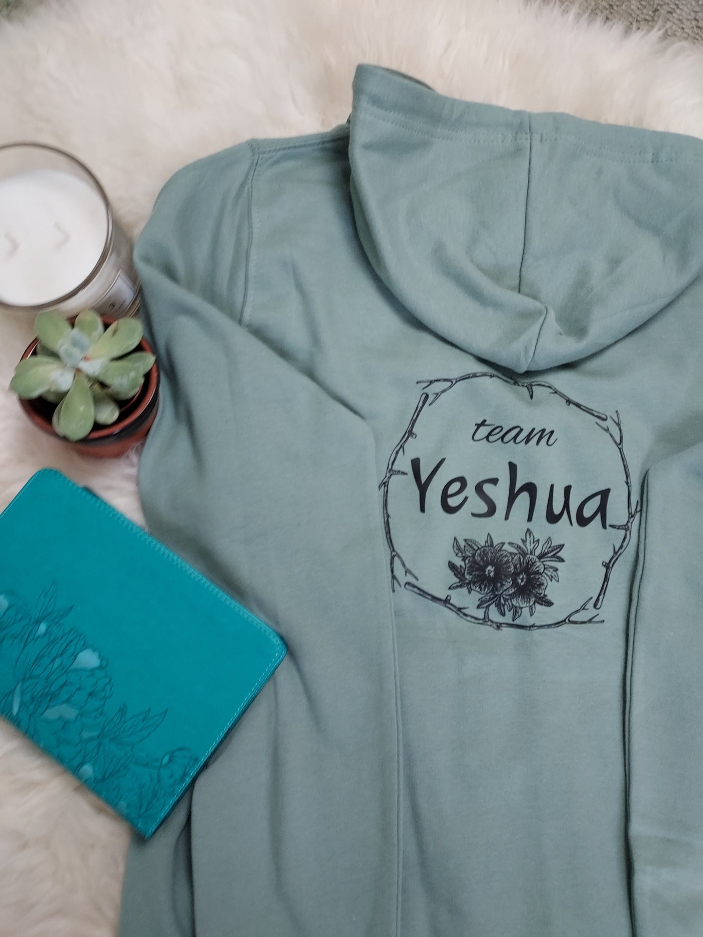 Jesus-themed Christian women's zip up hoodie with Team Yeshua design on the back