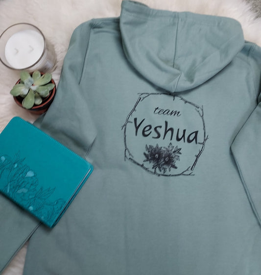 Jesus-themed Christian women's zip up hoodie with Team Yeshua design on the back