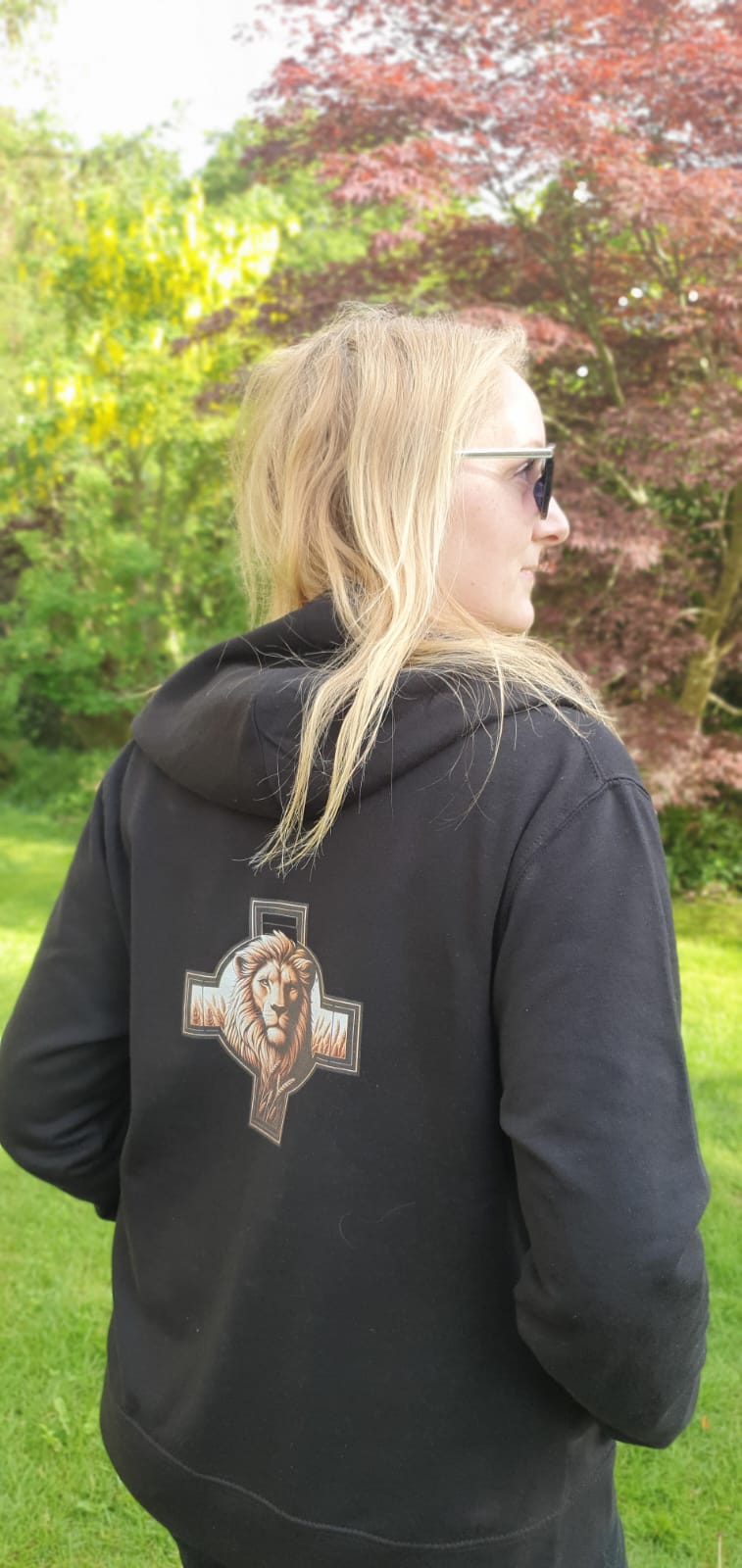 Christian women's zip up hoodie with Lion of Judah and cross design on the back