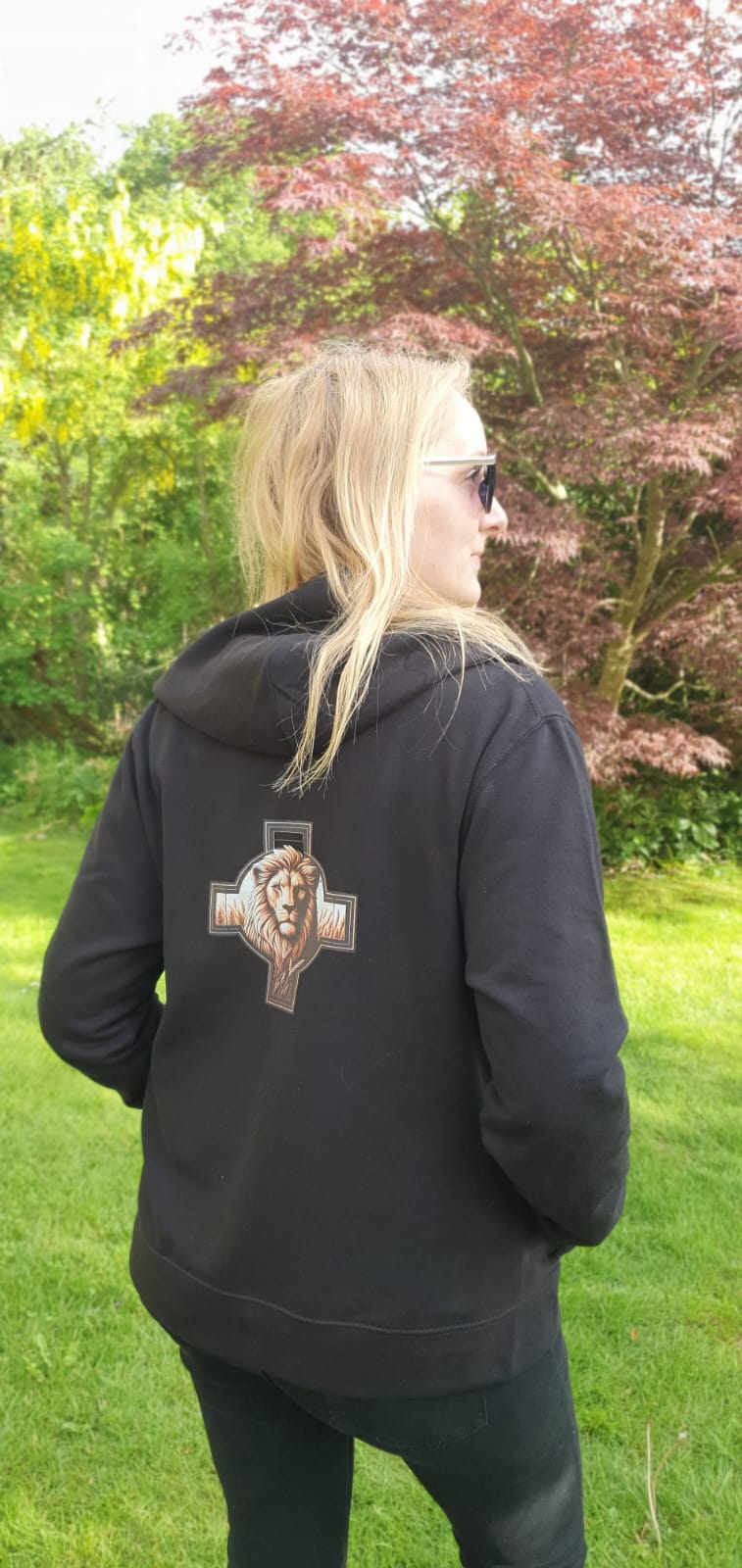 Christian women's zip up hoodie with Lion of Judah and cross design on the back